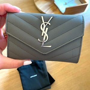 YSL wallet in gray pebble.